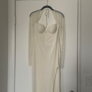 Cream/white maxi dress with slit.